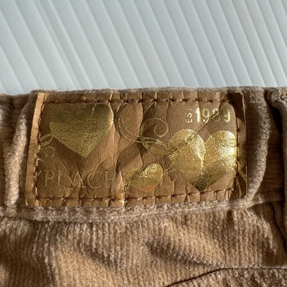 The Children’s Place light tan with gold glitter corduroy pants. Girls size 3T